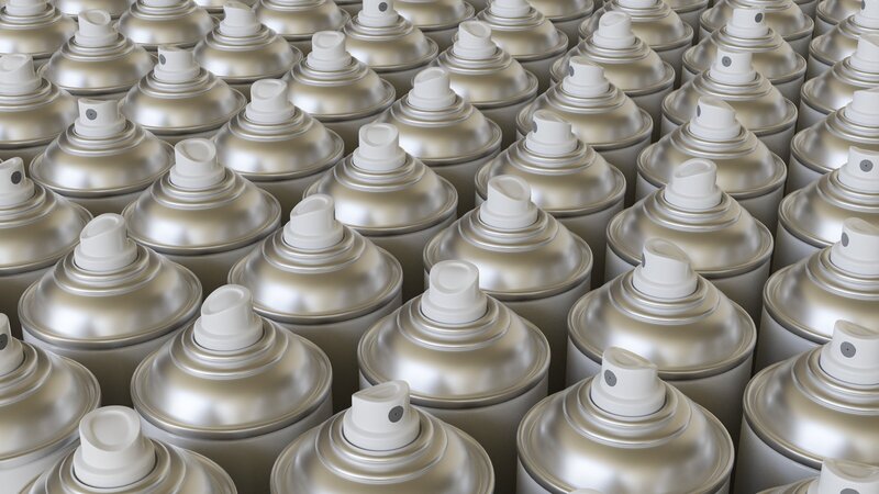 Packed grid of immaculate blank white aerosol cans under even studio lighting. This image is a 3d render.